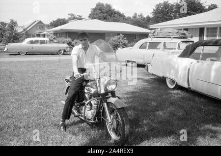 Elvis Presley With His Cadillacs In The Yard At Audubon Drive