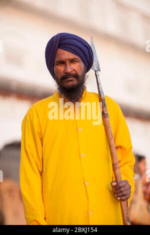 Sikh Man With Lance The Golden Temple Amritsar Punjab India Stock