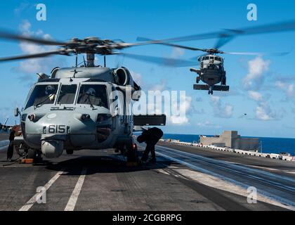 MH 60R Sea Hawk Approaches The Flight Deck USS Dewey DDG 105 In The