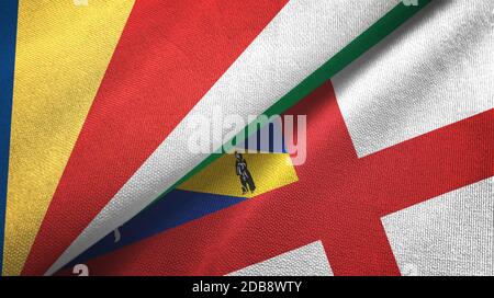 Herm And Seychelles Two Flags Textile Cloth Fabric Texture Stock Photo