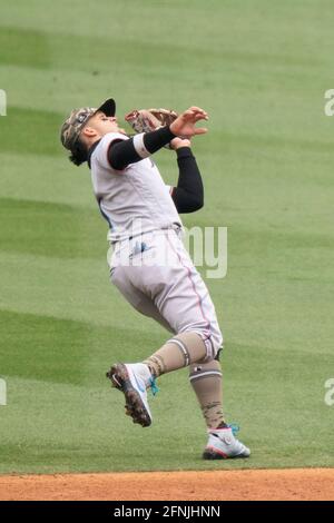 Miami Marlins Shortstop Miguel Rojas Throws To First To Put Out