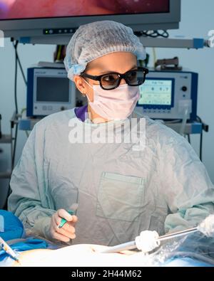 Surgeon Performs Minimally Invasive Laparoscopic Abdominal Surgery As