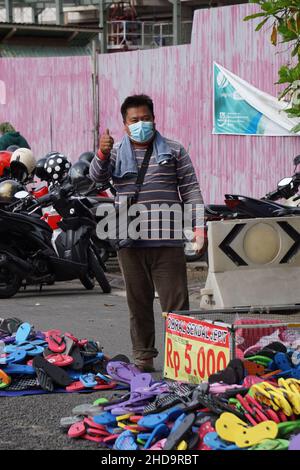 The Seller Of Indonesian Food And Drink At The Food Court On Simpang