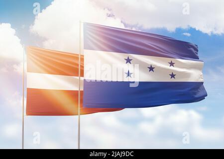 Waving Flag Of Honduras And Latvia Stock Photo Alamy