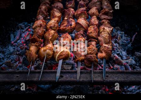 Preparing Pork Kebab Meat Skewers Grilled Or Roasted In A Barbecue On