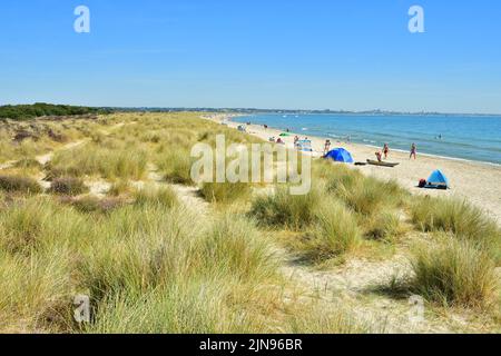 Uk Dorset Studland Bay Naturist Beach Sign With Naked Man And Discarded