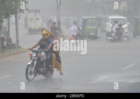 People Make Their Way During Heavy Rainfall Incessant Rains For The