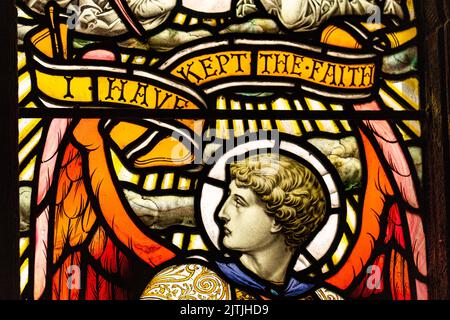 A Stained Glass Window Featuring Scripture And Knights Scotland UK