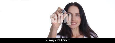 Smiling Woman Pointing To Something Imaginary Stock Photo Alamy