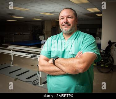 Brian Freeman Physical Therapy Technician Assists A Patient With Gait