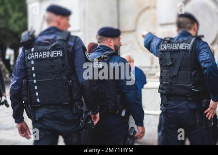 Italian Police Squad Patrol Formation Back View With Local Police