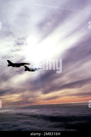 An Air To Air Right Side View Of A 50th Tactical Fighter Wing F 16A