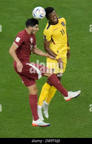 Qatar S Karim Boudiaf And Ecuador S Michael Estrada Go For A