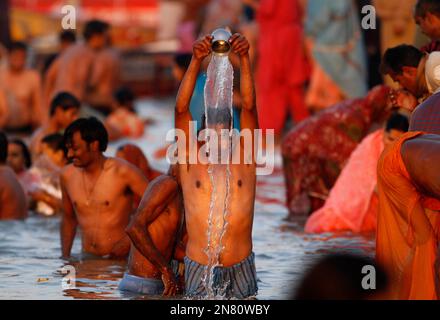 Millions Of Hindu Devotee Take Holy Dip On Makar Sankranti In