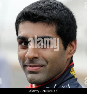 Indian Formula One Driver Karun Chandhok Of Lotus Leaves The Car After