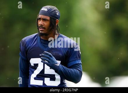 Seattle Seahawks Running Back Kenny McIntosh 25 Holds A Football