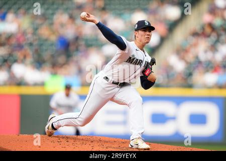 Seattle Mariners Starting Pitcher Bryan Woo Watches A Throw To A