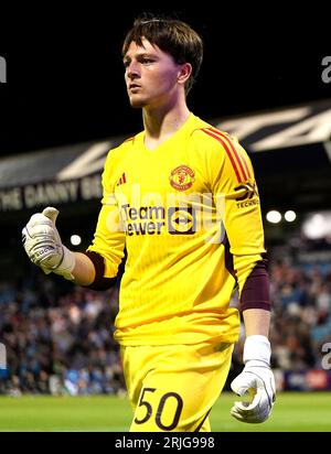 Manchester United Goalkeeper Elyh Harrison Warms Up Ahead Of The