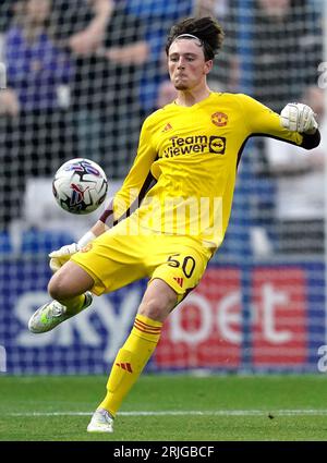 Manchester United Goalkeeper Elyh Harrison Warms Up Ahead Of The