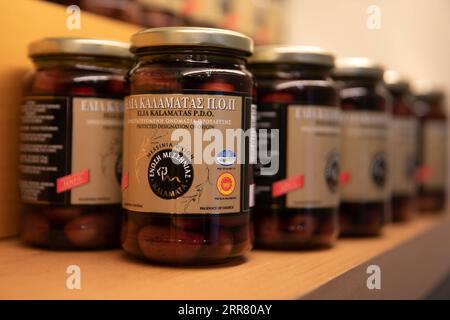 Big Black Olives In Brine Stock Photo Alamy