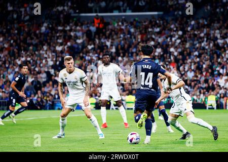 Toni Kroos Of Real Madrid And Takefusa Kubo Of Villarreal Compete For