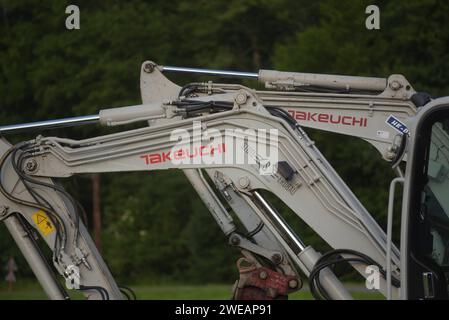 Takeuchi Excavator At A Construction Site Heavy Machinery For