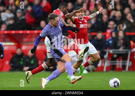 Taiwo Awoniyi Of Nottingham Forest Battles With Matt Doherty Of