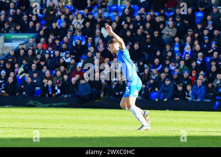 Harrison Burrows Of Peterborough United Celebrates With Team Mates At