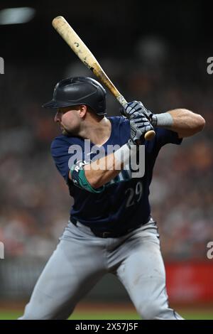 Seattle Mariners Catcher Cal Raleigh Holds The Ball During A Play