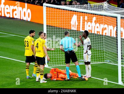 Real Madrid S Vinicius Junior Is Shown A Yellow Card After Fouling