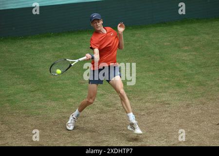 Jannik Sinner Of Italy Plays A Forehand Return To Alex De Minaur Of