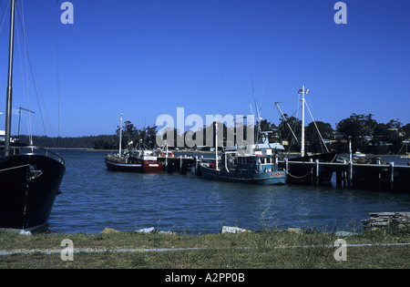 Fishing boats and Georges Bay, St. Helens, Tasmania, Australia Stock