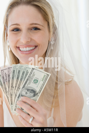 Portrait Of Woman Holding Twenty Dollar Bills In Hand Stock Photo Alamy