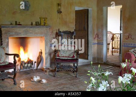 La Colombaia Tuscan Farmhouse Interior With Fireplace La Colombaia Tuscan Farmhouse Interior With Fireplace