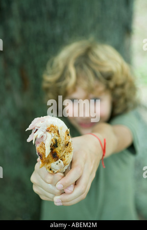 Boy Holding Grilled Chicken Leg Smiling At Camera Portrait Stock