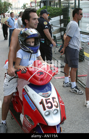 Miami Florida Girl Wearing Helmet On Motor Scooter Miami Florida Girl Wearing Helmet On Motor Scooter