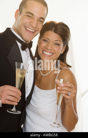 http://l450v.alamy.com/450v/awbg58/bride-and-groom-celebrating-awbg58.jpg