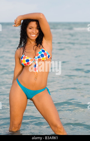 Hispanic Woman Wearing Bikini In Water Stock Photo Alamy