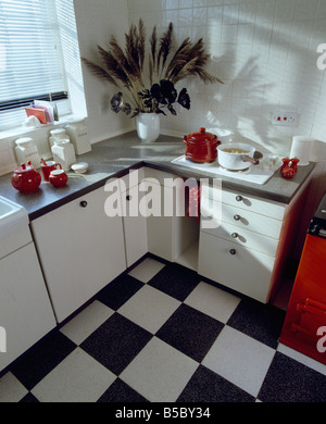 Black And White Kitchen Vinyl Flooring black+white tiled vinyl floor in fifties kitchen with red worktops Black And White Kitchen Vinyl Flooring black+white tiled vinyl floor in fifties kitchen with red worktops
