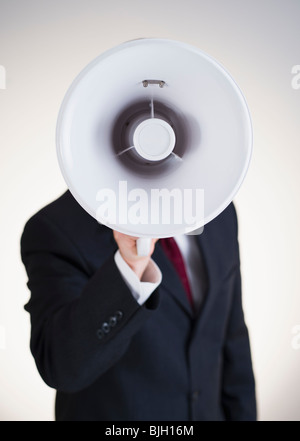 Businessman Shouting Into A Bullhorn Stock Photo Alamy