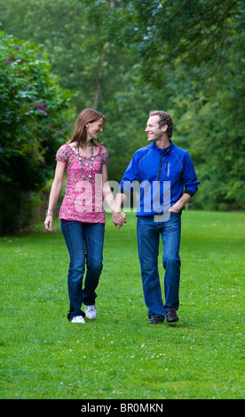 http://l450v.alamy.com/450v/br0mkn/couple-walking-together-in-a-rural-setting-br0mkn.jpg