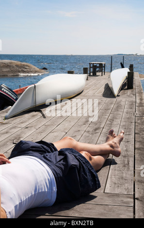 A Woman By The Sea In The Archipelago Of Stockholm Sweden Stock Photo Alamy