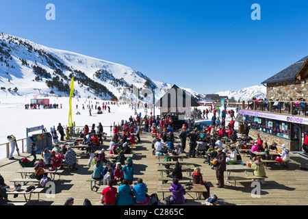 Skiers Sitting At A Crowded Restaurant In Front Of The Matterhorn