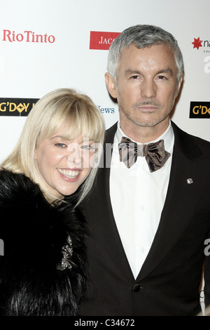 Baz Luhrmann And His Wife Catherine Martin Posing At Chanel Photocall