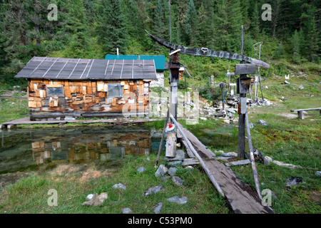 Wood Hut In Taiga With National Symbols And Images Mineral Springs