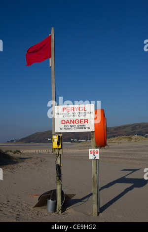 Life Belt With Warning Sign On Risks And Hazards In Seafaring And