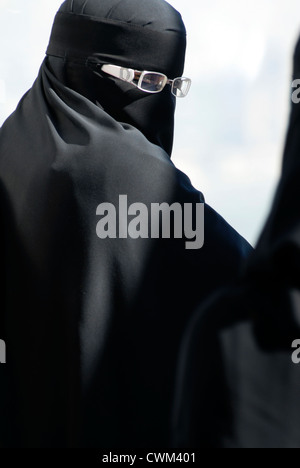 Islamic Muslim Woman Wearing A Burqa Niqab Burka And Making A Rude 