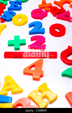 Colored Letters And Numbers Of Plastic On Wooden Table Stock Photo Alamy