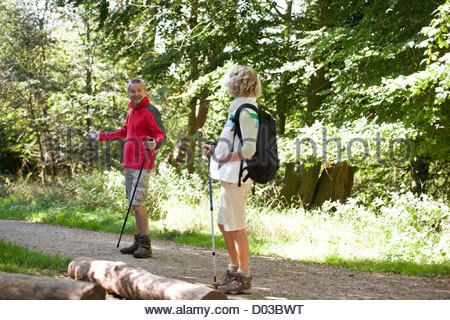 http://l450v.alamy.com/450v/d03bwt/a-mature-couple-walking-along-a-country-path-navigating-with-a-smartphone-d03bwt.jpg