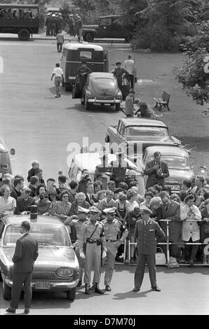 People Waiting For The President To Pass By Us President John F